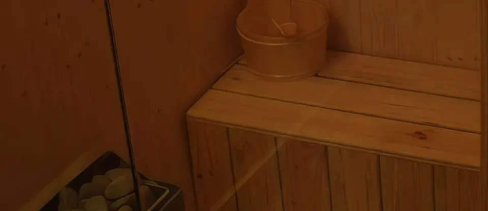돌과 나무 양동이가 있는 건식 사우나